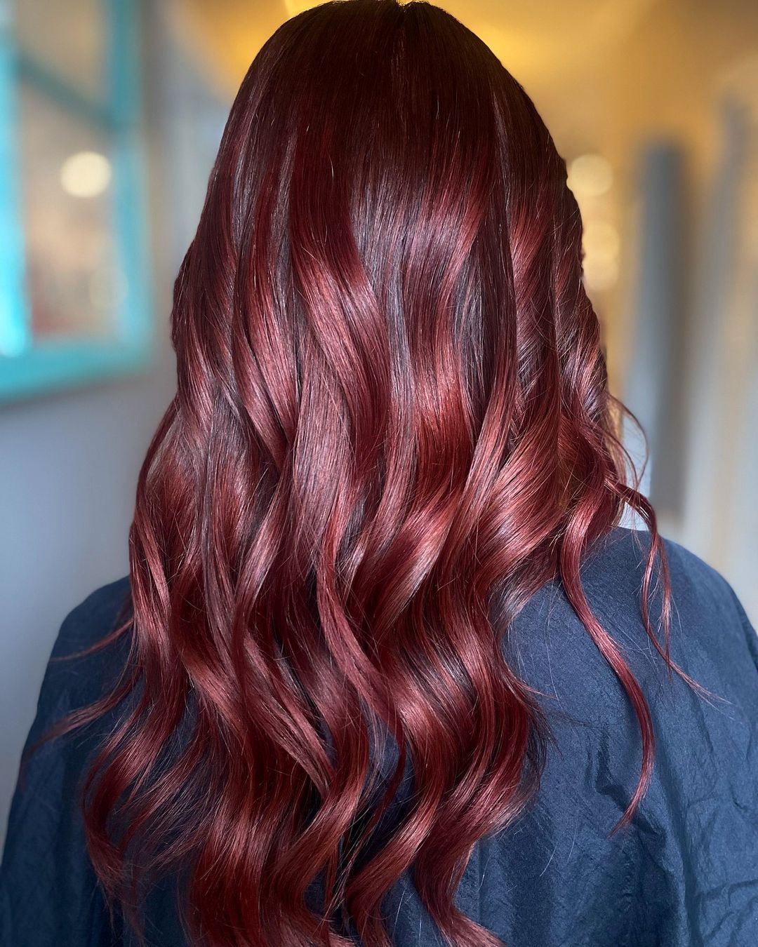 Glossy Sun-Kissed Burgundy Hair